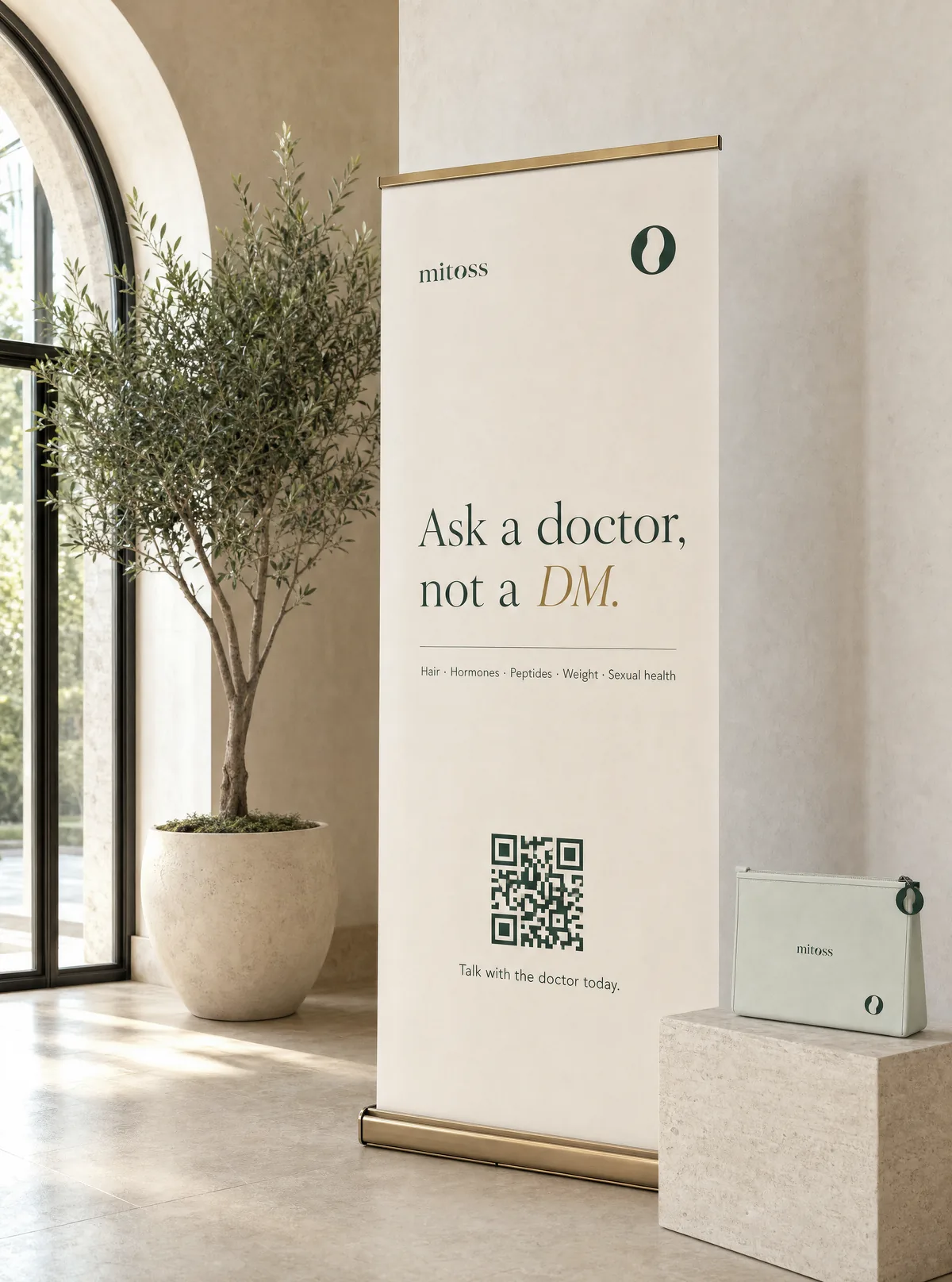 A cream roll-up banner in a lobby: Ask a doctor, not a DM