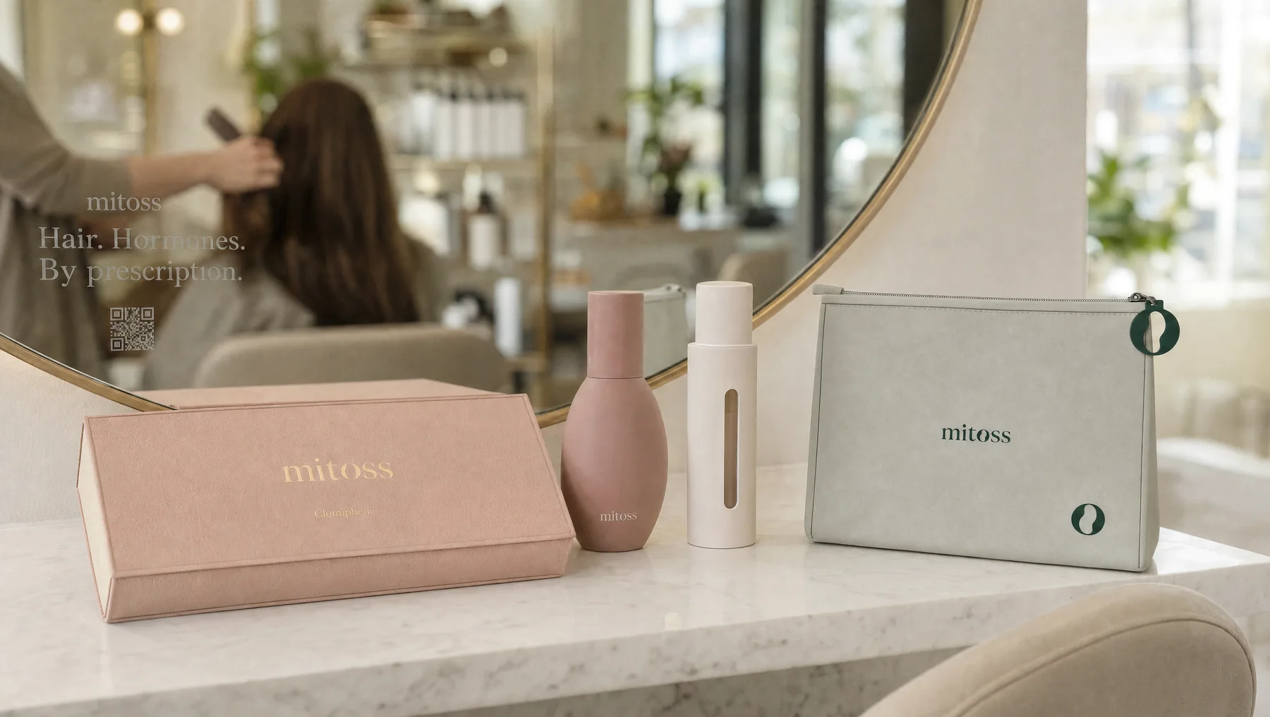A salon counter with the Mitoss clomiphene box, two containers and the pouch, a stylist at work in the mirror