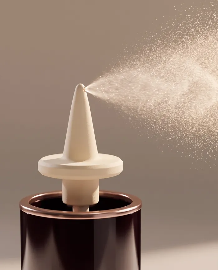 A fine mist leaves the tip of the Mitoss PT-141 nasal applicator
